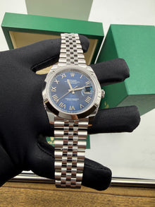 Rolex 126300 “Bright Blue Roman”  Dated 07-2026 Unworn